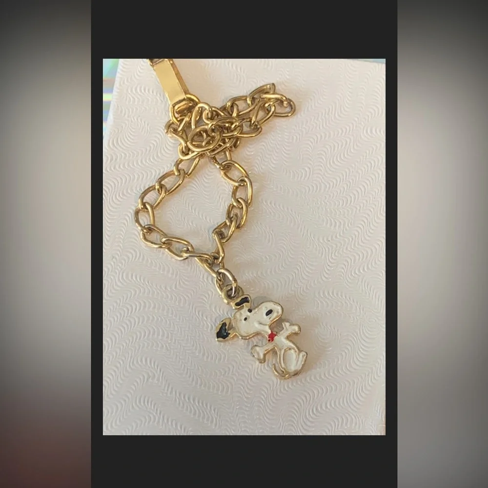 United features vintage gold tone 6” snoopy bracelet